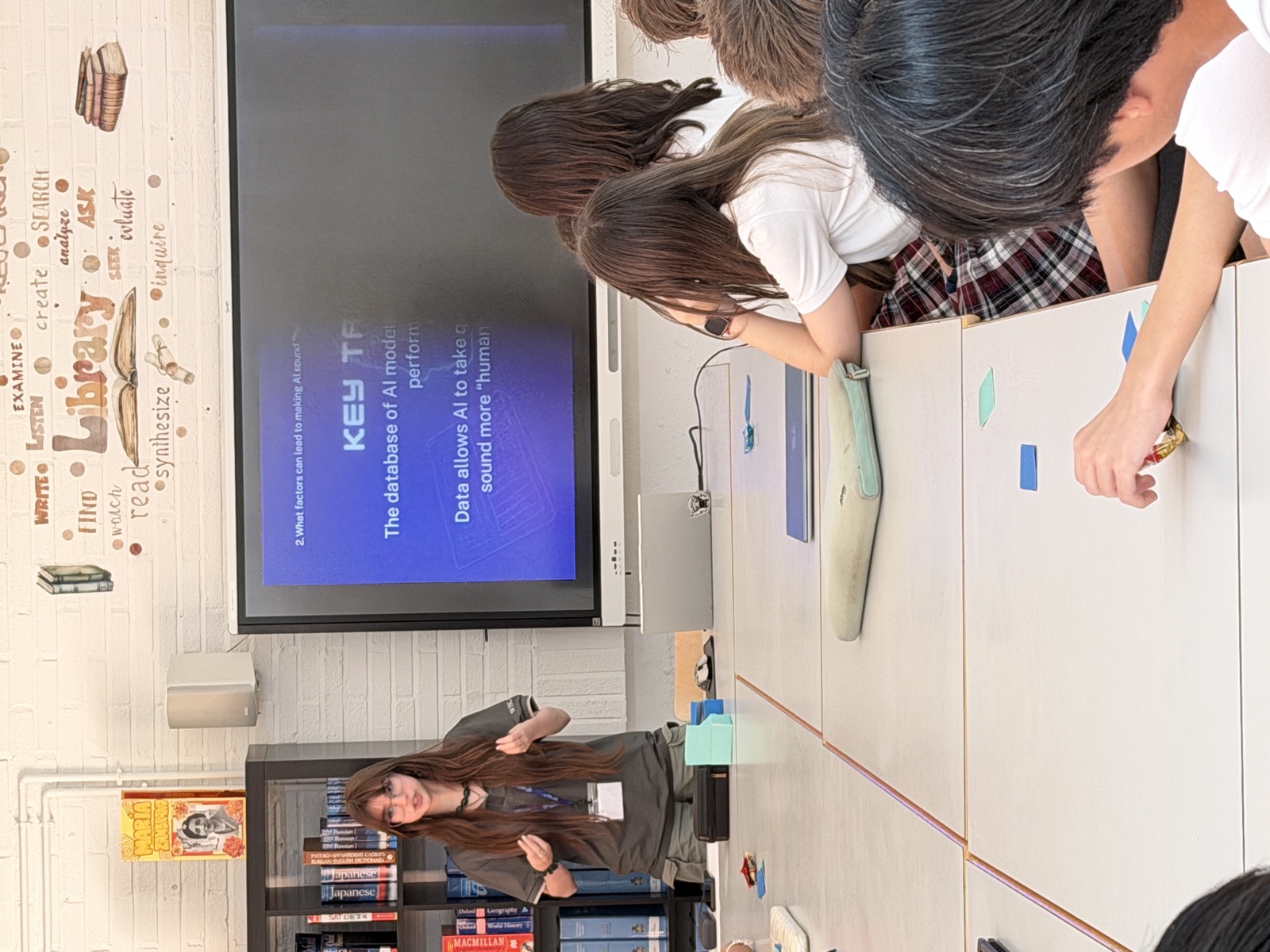 A Wikair volunteer presenting an AI workshop in a school library
